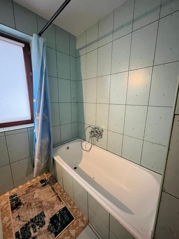 łazienka w obiekcie Pokoje u Cekusa w mieście Białka Tatrzanska